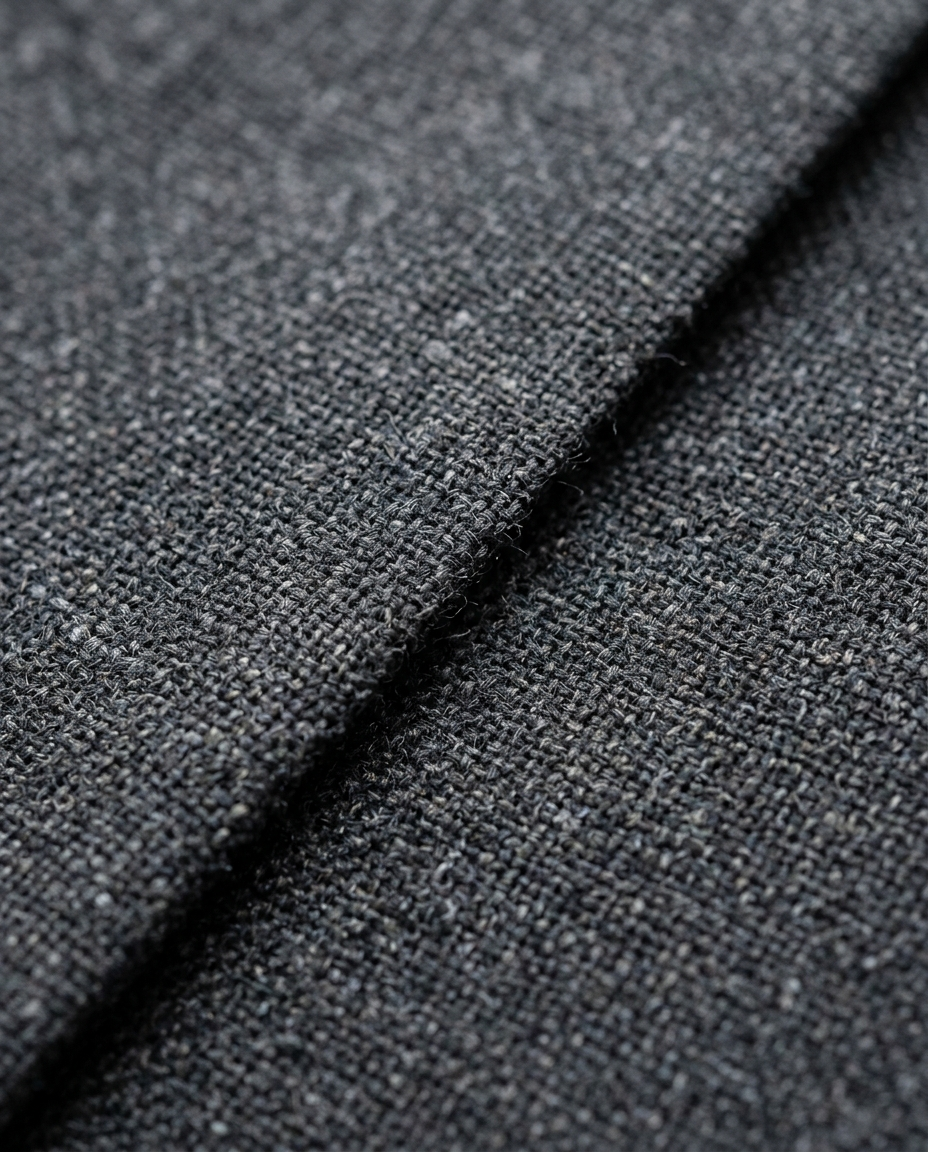 Fine wool blend suiting fabric texture of the Tailored Trousers Soft Grainline in charcoal